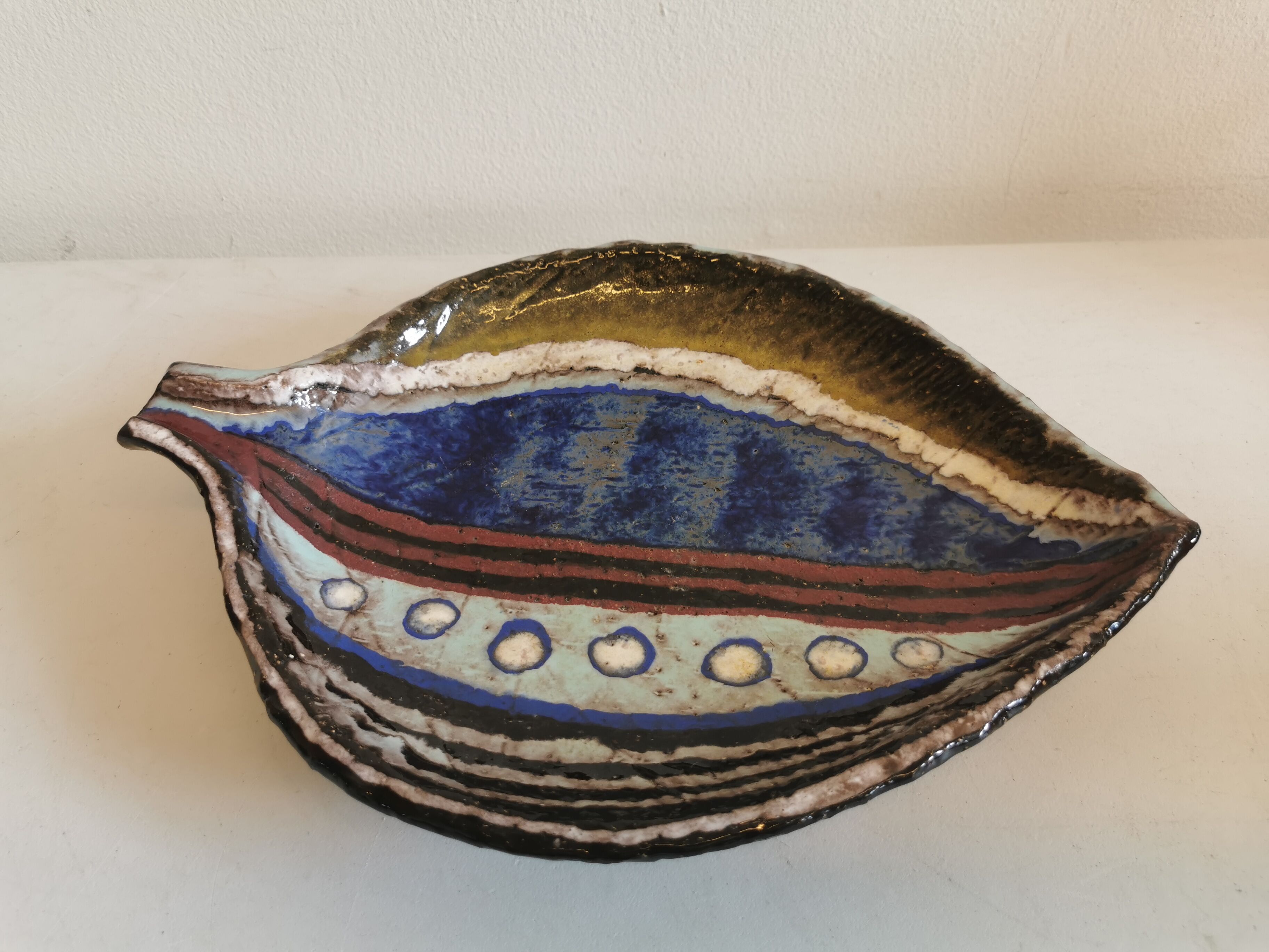 Danish ceramic dish shaped like a leaf.