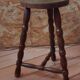 Tripod stool with turned legs