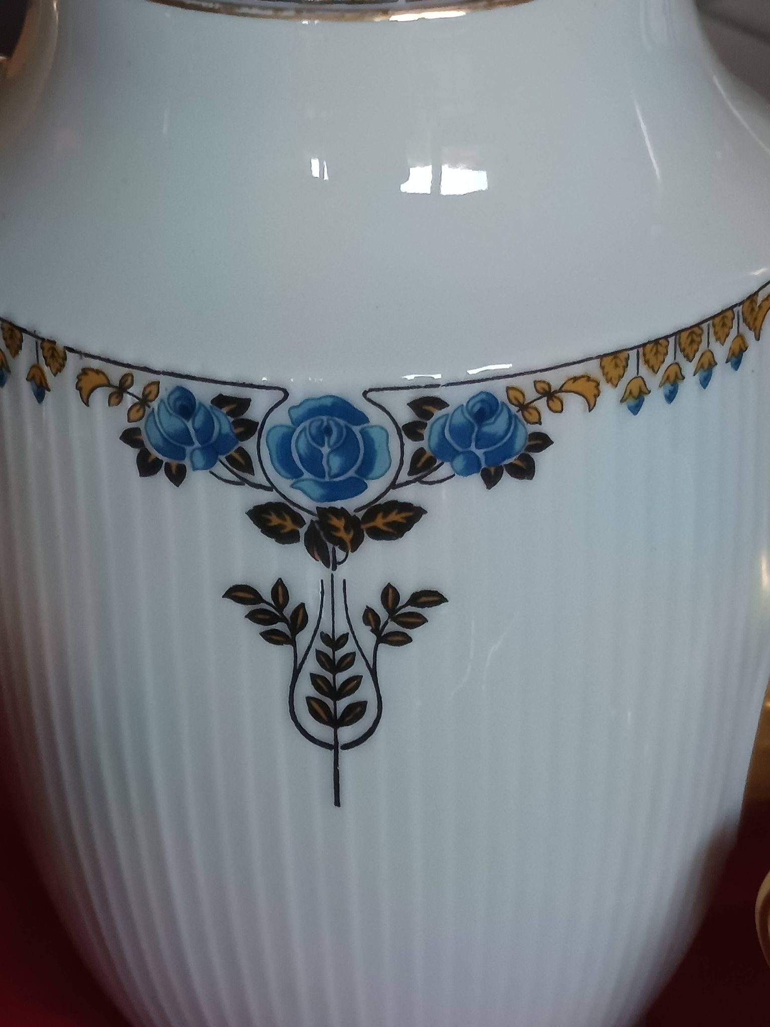 Antique Limoges porcelain coffee/tea service – 14 pieces with blue rose decoration.