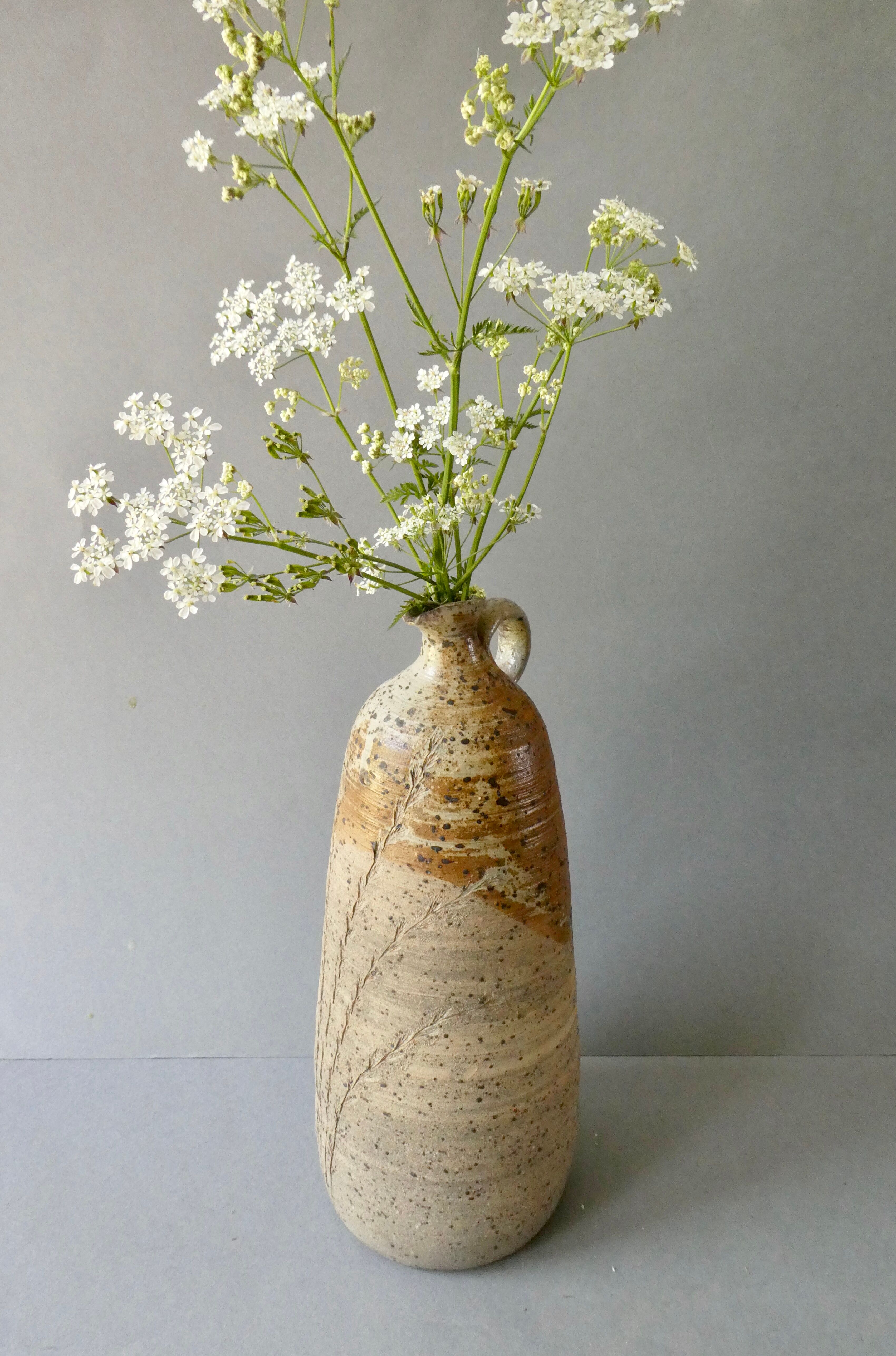 Stoneware bottle vase decorated with herbarium by Carole Boissière