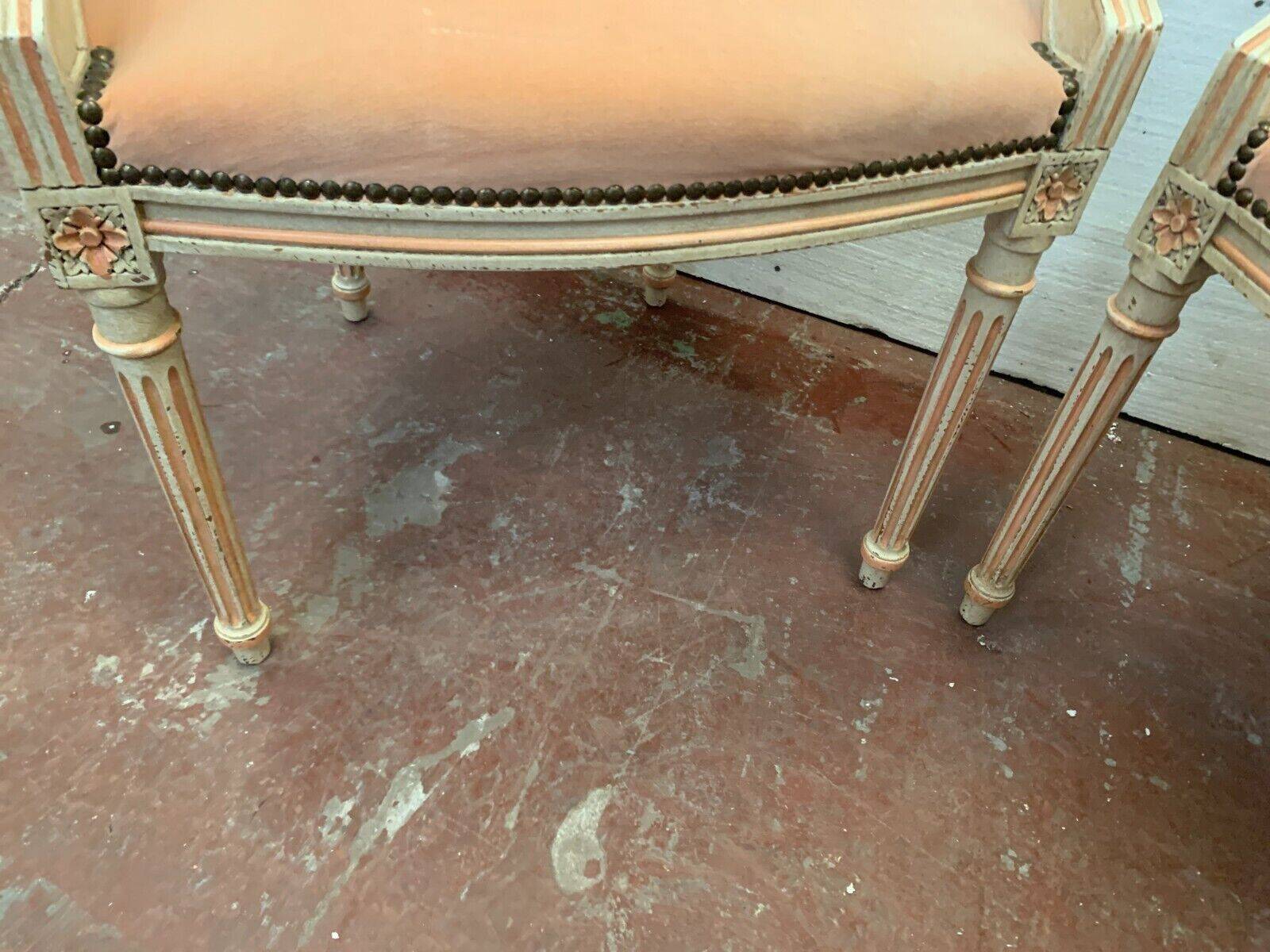 Pair of Louis XVI style armchairs in 20th century patinated beech