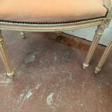Pair of Louis XVI style armchairs in 20th century patinated beech