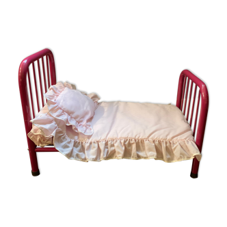 pink metal doll bed