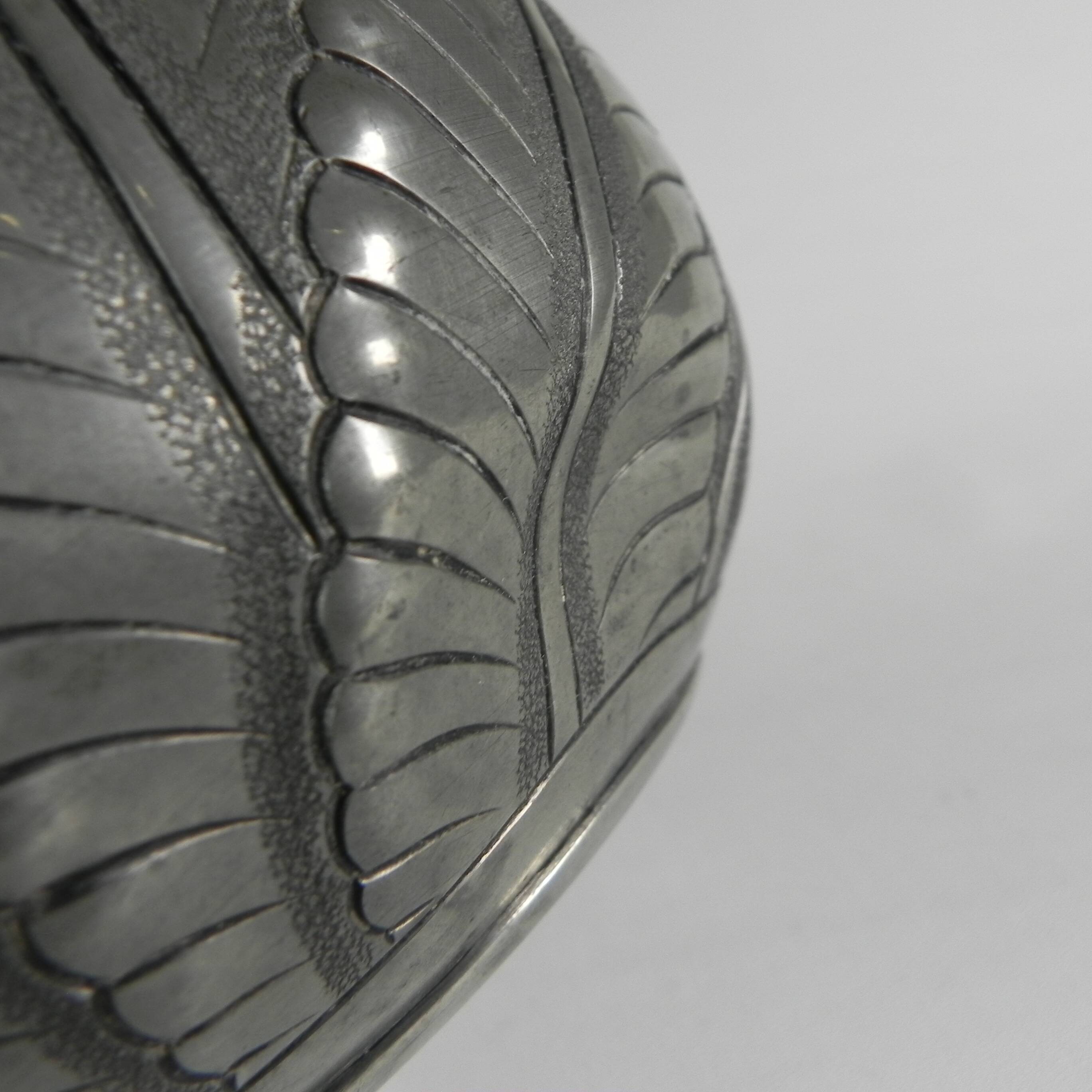 Art Nouveau pewter vase, signed PETIZON, early 20th century.