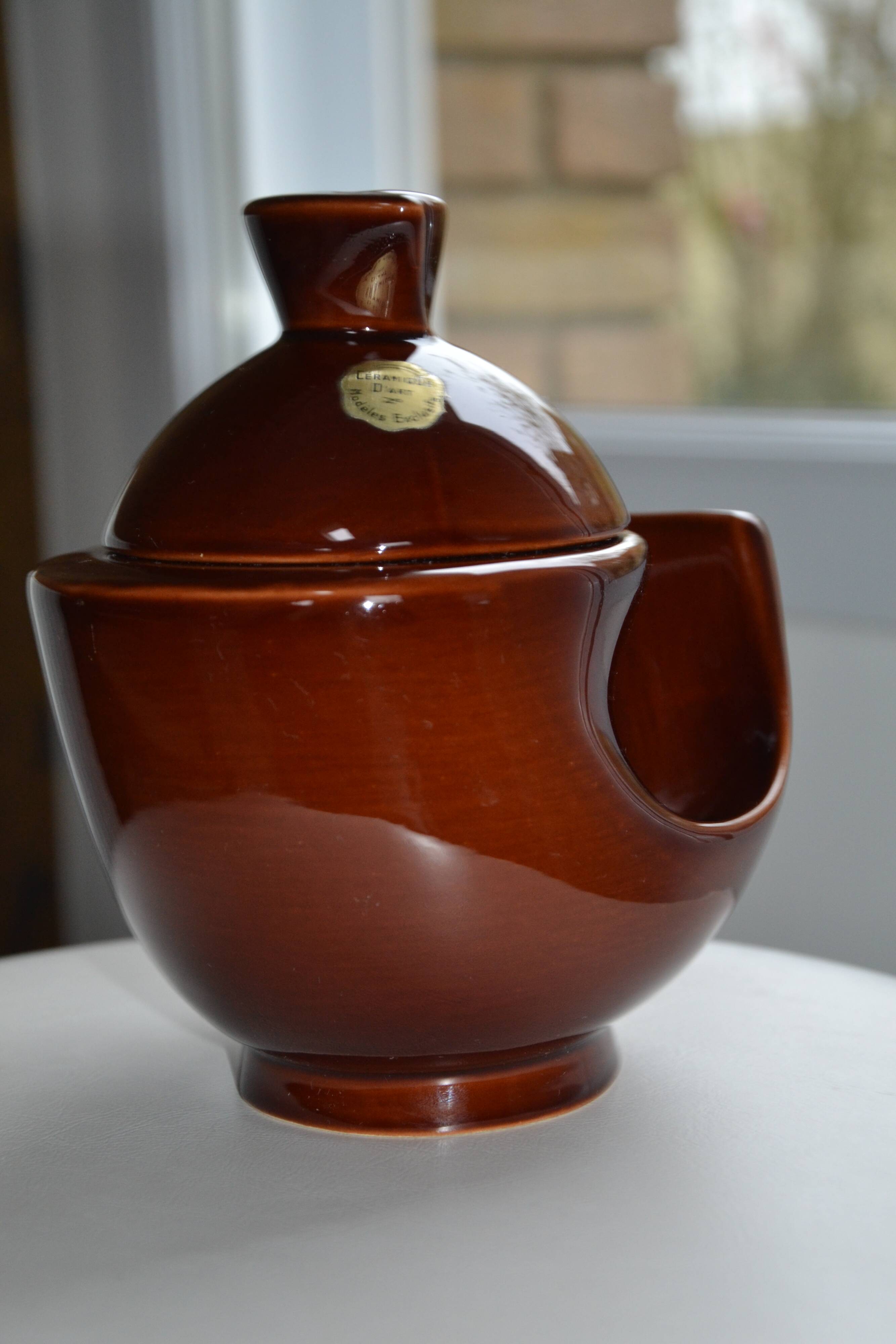 Brown ceramic pot
