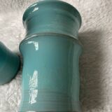 Two lovely turquoise ceramic mug vases.
