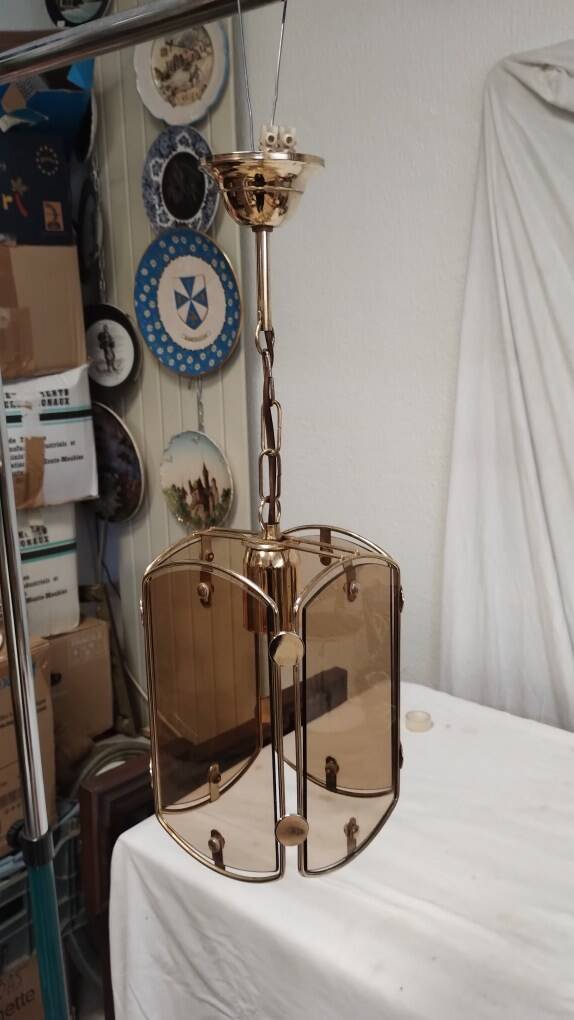 Suspension in gold metal and smoked glass