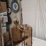 Suspension in gold metal and smoked glass