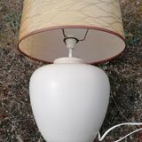 Vintage ceramic table lamp and golden lampshade.