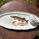 Large fish platter and its vintage porcelain sauce boat, decorated with pike.