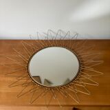 Sun mirror in gilded metal