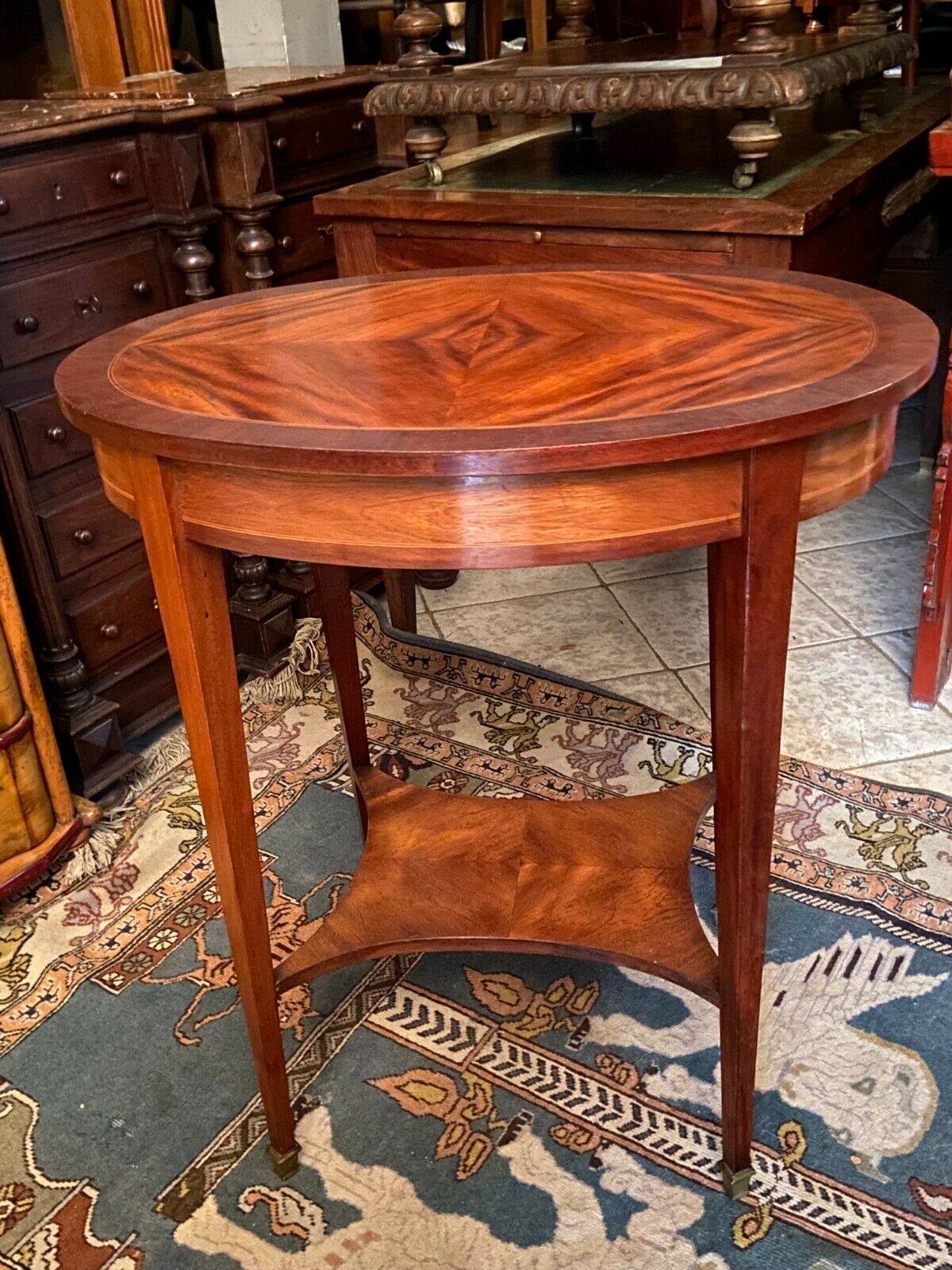 Oval pedestal table with a drawer and a tablet decorated inlaid Louis XVI style