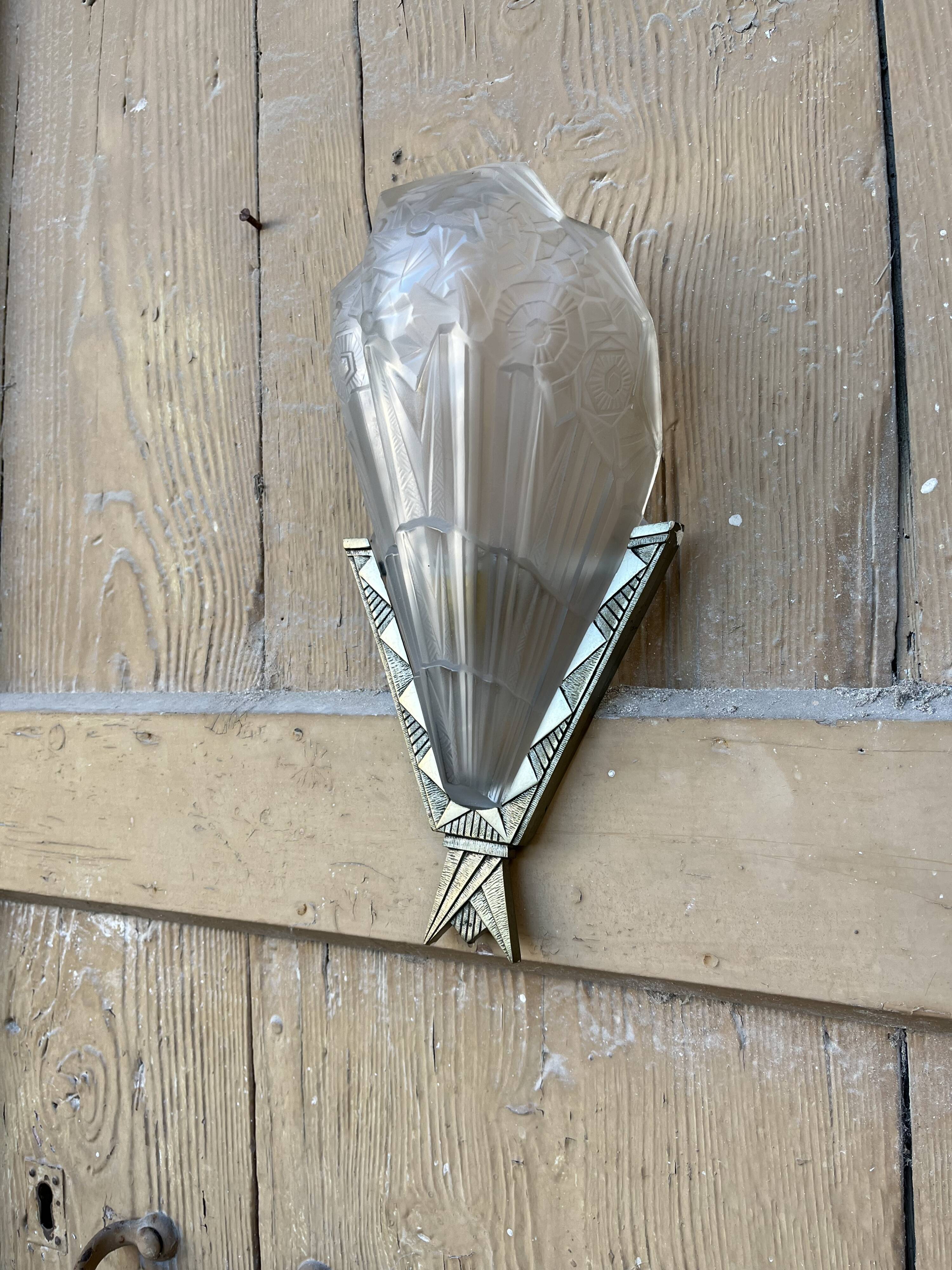 Signed art deco wall light