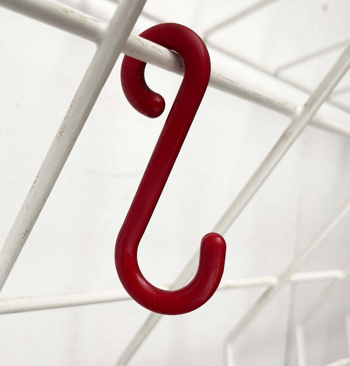 Minimalist white German mid-century coat rack with strings from the 1960s.