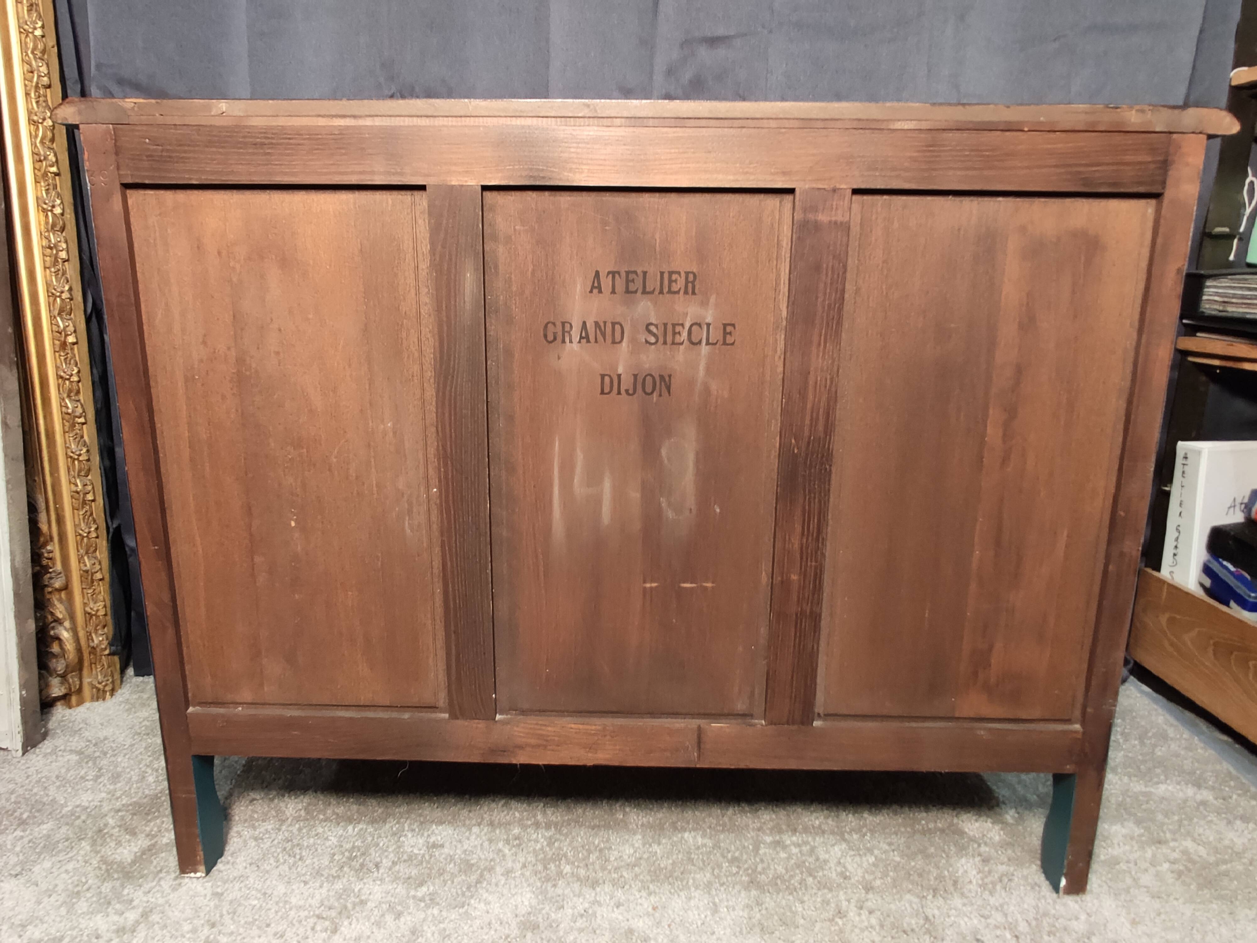 Patinated crossbow chest of drawers