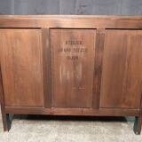 Patinated crossbow chest of drawers