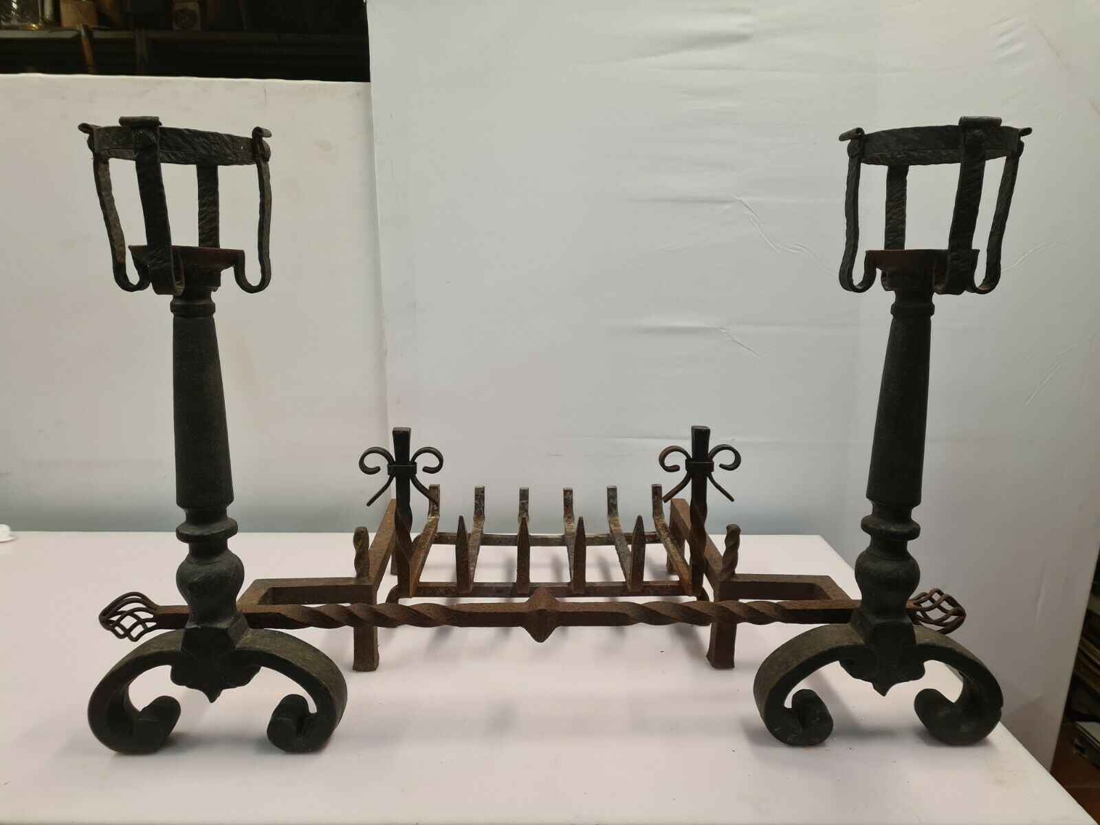 Pair of cast iron andirons for the fireplace