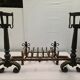 Pair of cast iron andirons for the fireplace