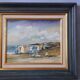 Antique oil painting depicting a seaside scene