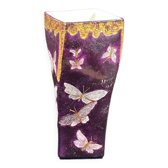 Twisted vase decorated with butterflies enhanced with gold, signature to identify