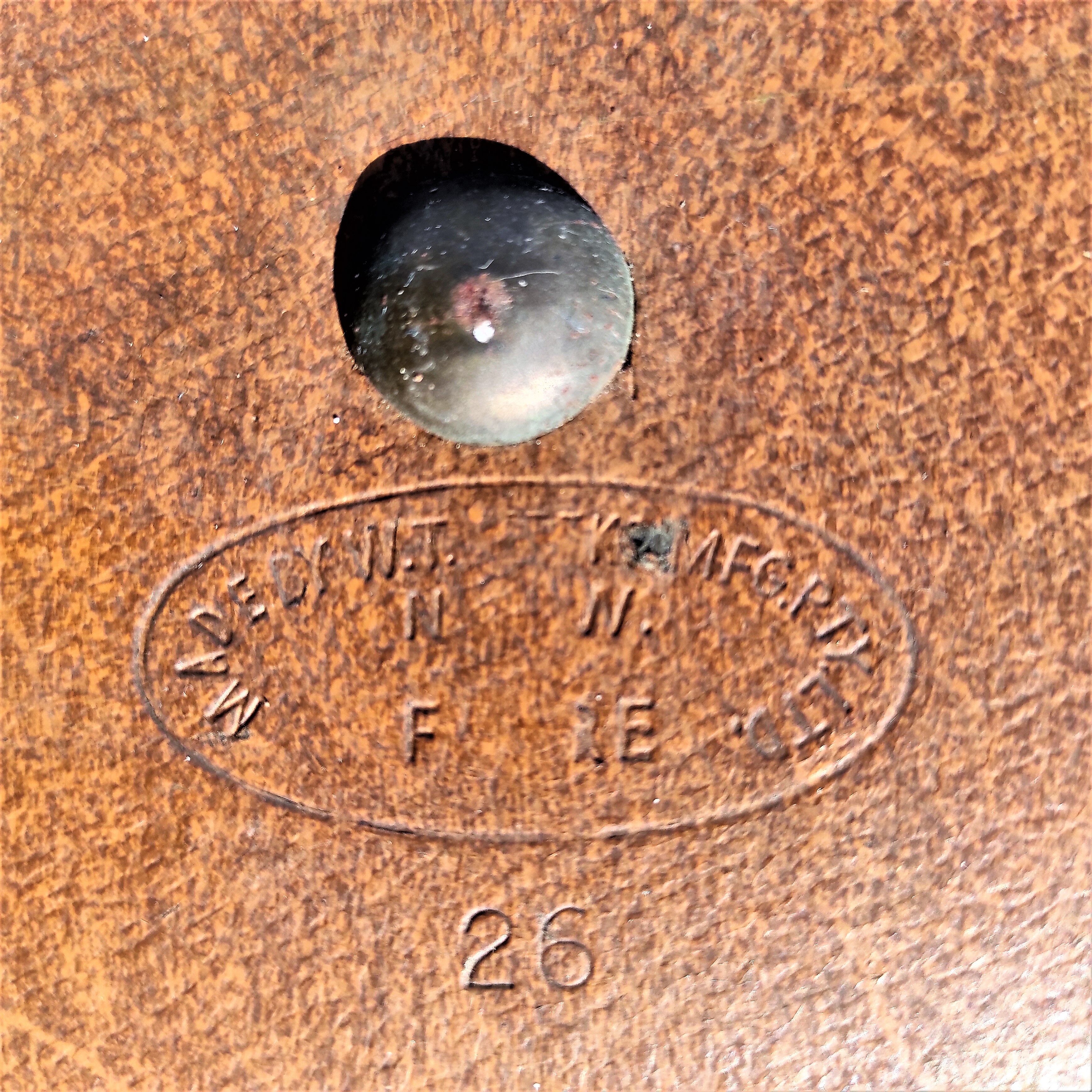 Brown vintage suitcase with CHENEY England brand travel tags