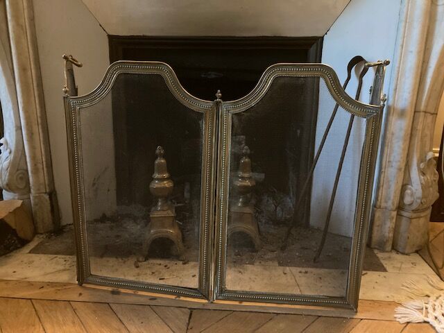 Old brass fire shield