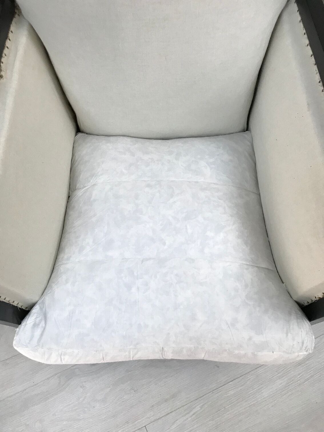 Pair of blackened wooden armchairs