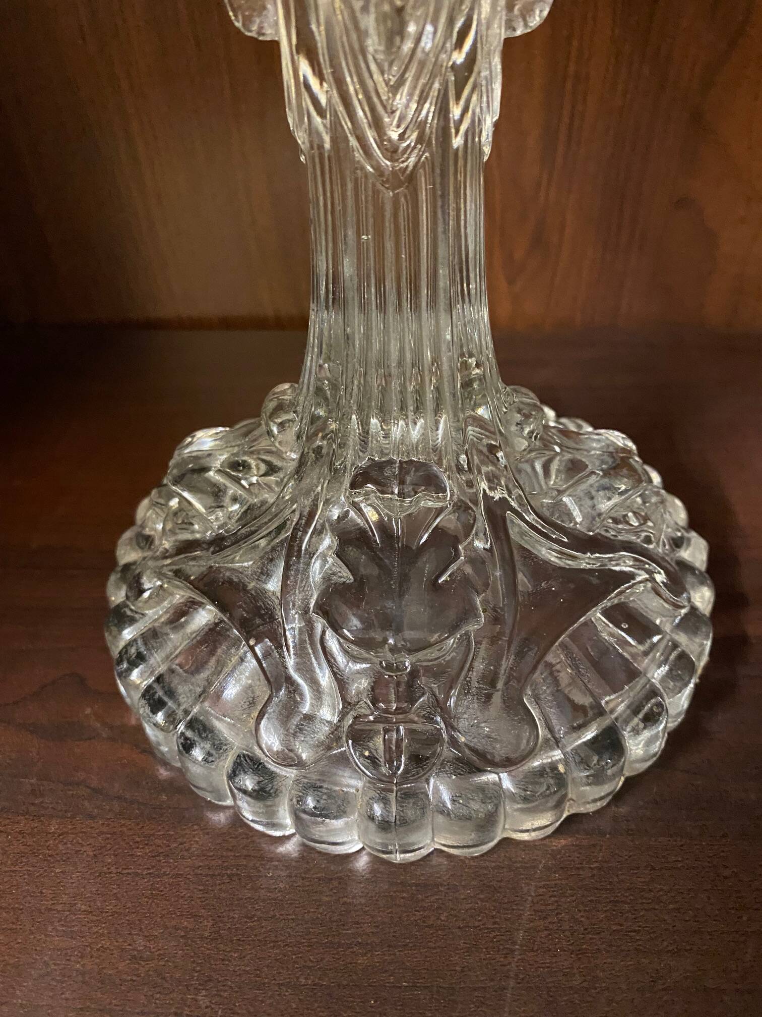 pair of cut glass candlesticks with lion and ram head decor, late 19th century