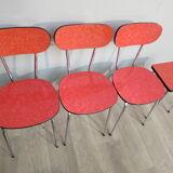 Table, 3 chairs and red formica stool