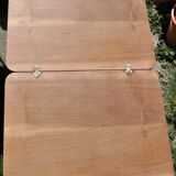 Table basse à plateau pivotant