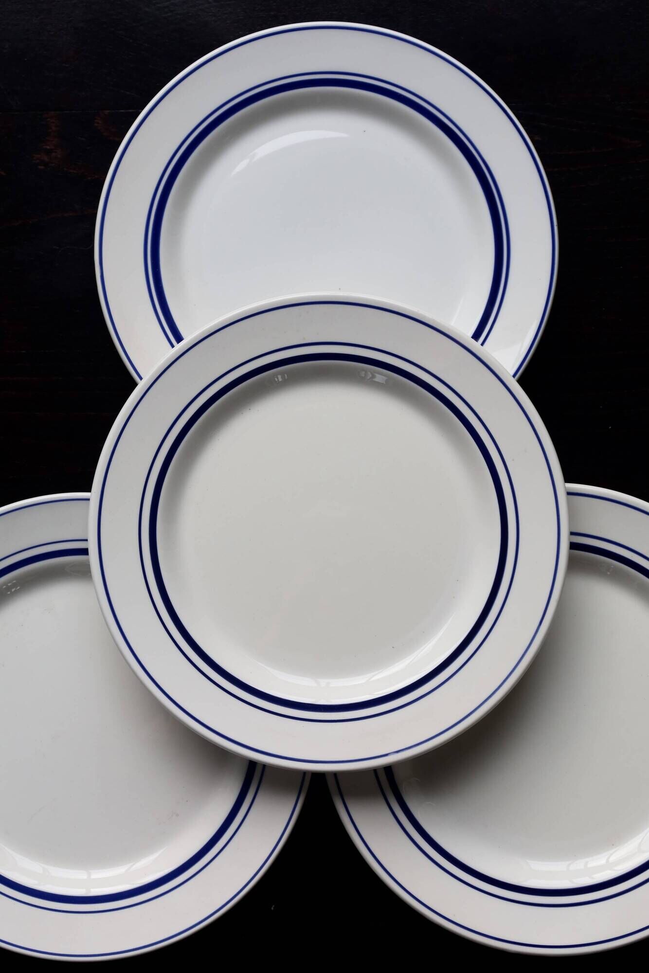 4 vintage bistro style flat plates in blue and white porcelain