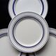 4 vintage bistro style flat plates in blue and white porcelain