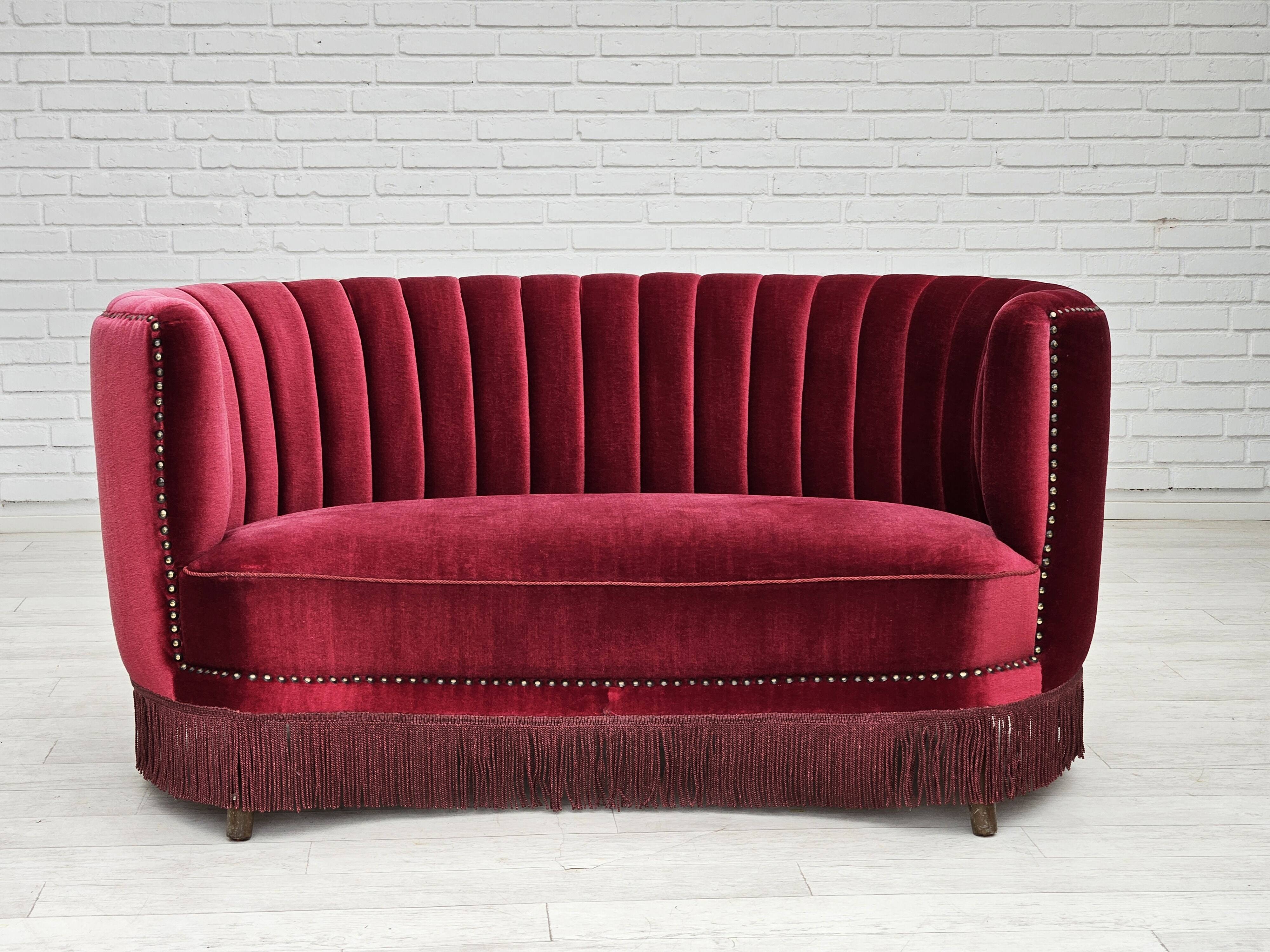 1970s, Danish 2-seater "Banana" sofa, original cherry-red velour.