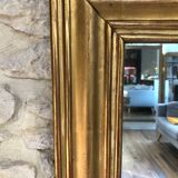 Mirror period 19th gilded with gold leaf 158.5cm / 113cm mercury ice pricked, parquet on the back.