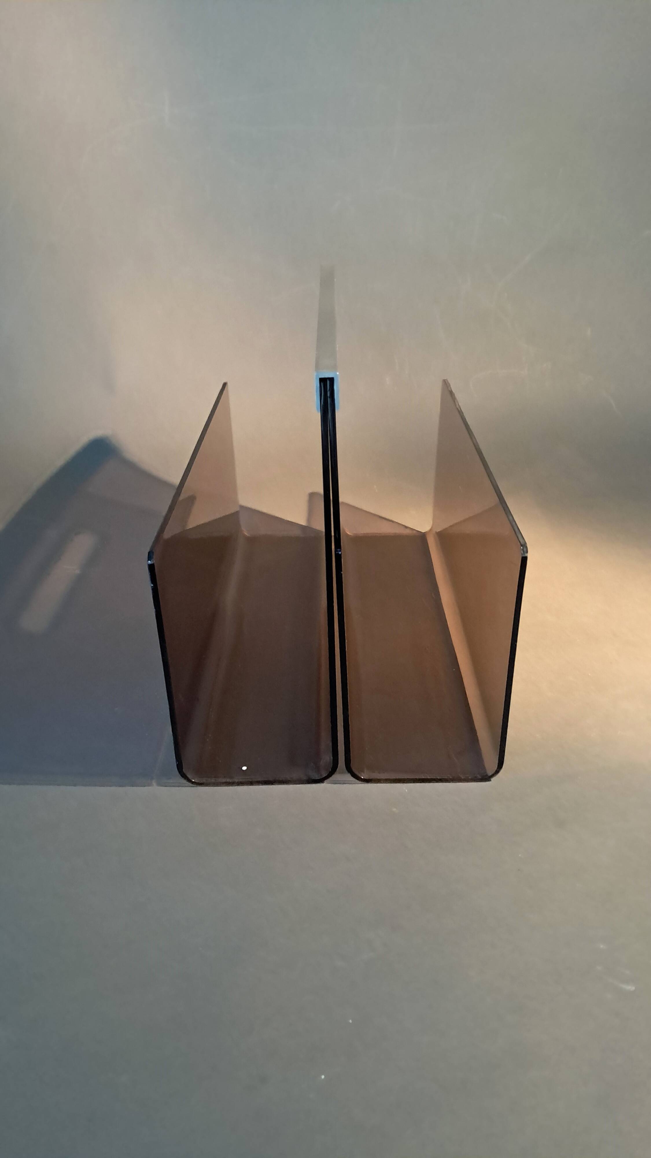 Smoked plexiglass magazine rack, Michel Dumas 1970.