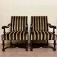 Large paire de fauteuils style Louis XIV en noyer
