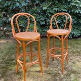 Set of four cane and webbing bar stools