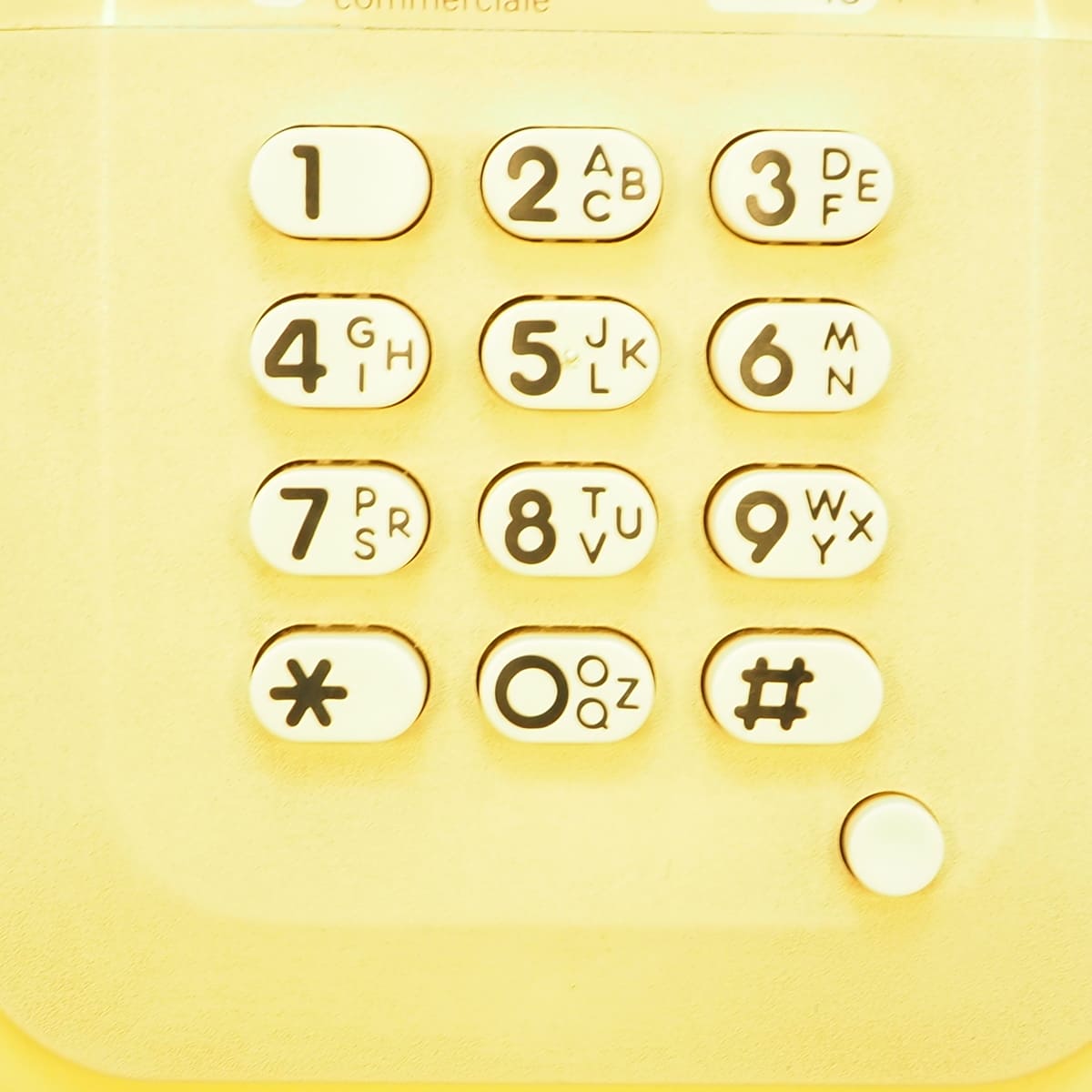Vintage beige phone with keys