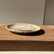 Vide poche, plat ou assiette circulaire en bois pétrifié beige tache noire