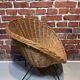 Wicker and metal armchair