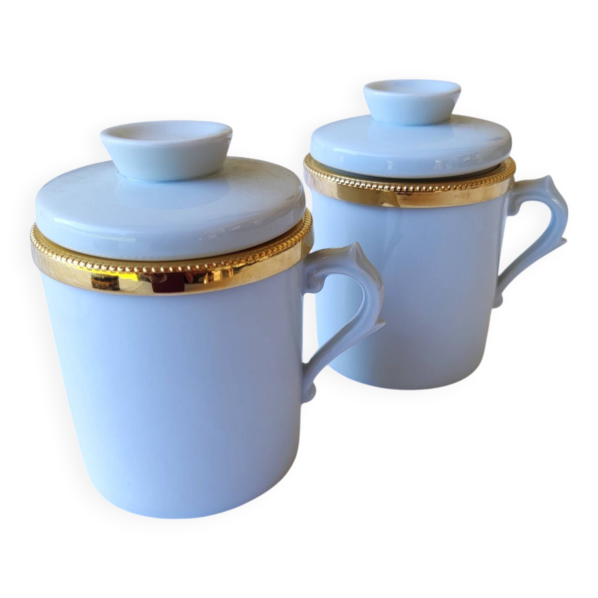 2 white and gold Limoges porcelain tea cups