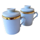 2 white and gold Limoges porcelain tea cups