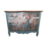 Patinated crossbow chest of drawers