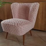 Mid-century cocktail chair in pink faux fur, solid beech legs, vintage style.