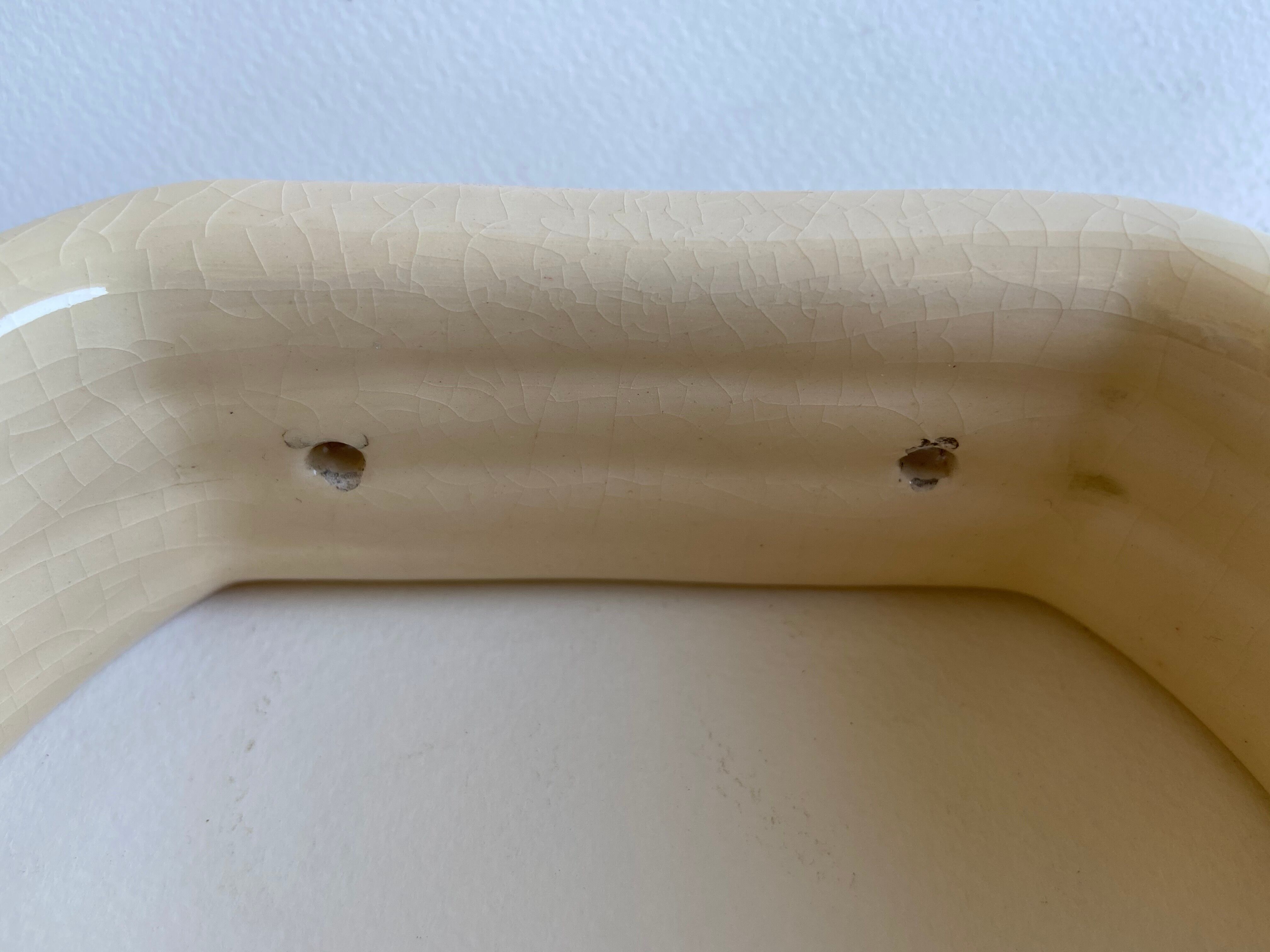 Enamelled ceramic wall pad