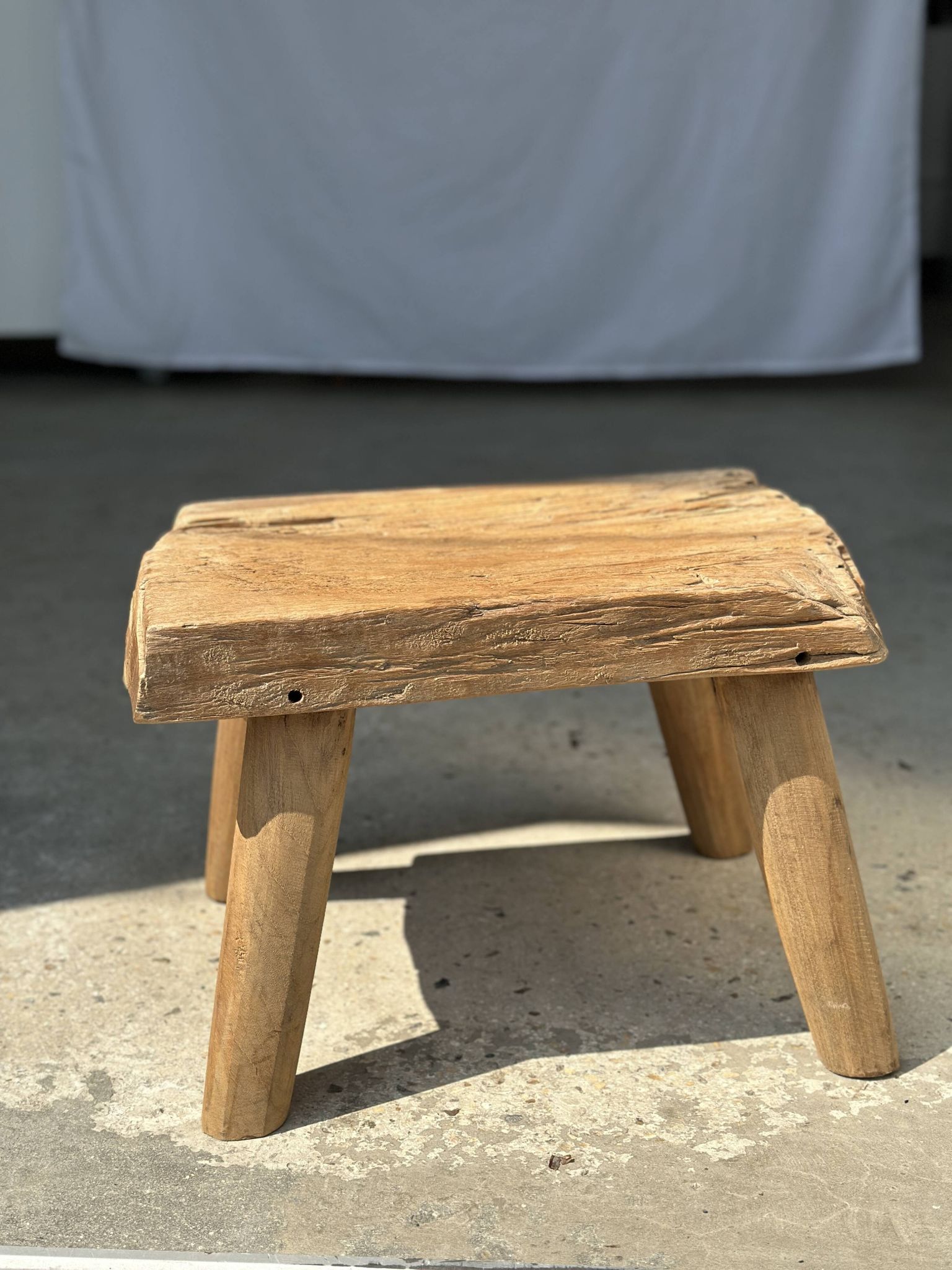 Small side table or stool in four-legged blond teak H:30 L43 l30