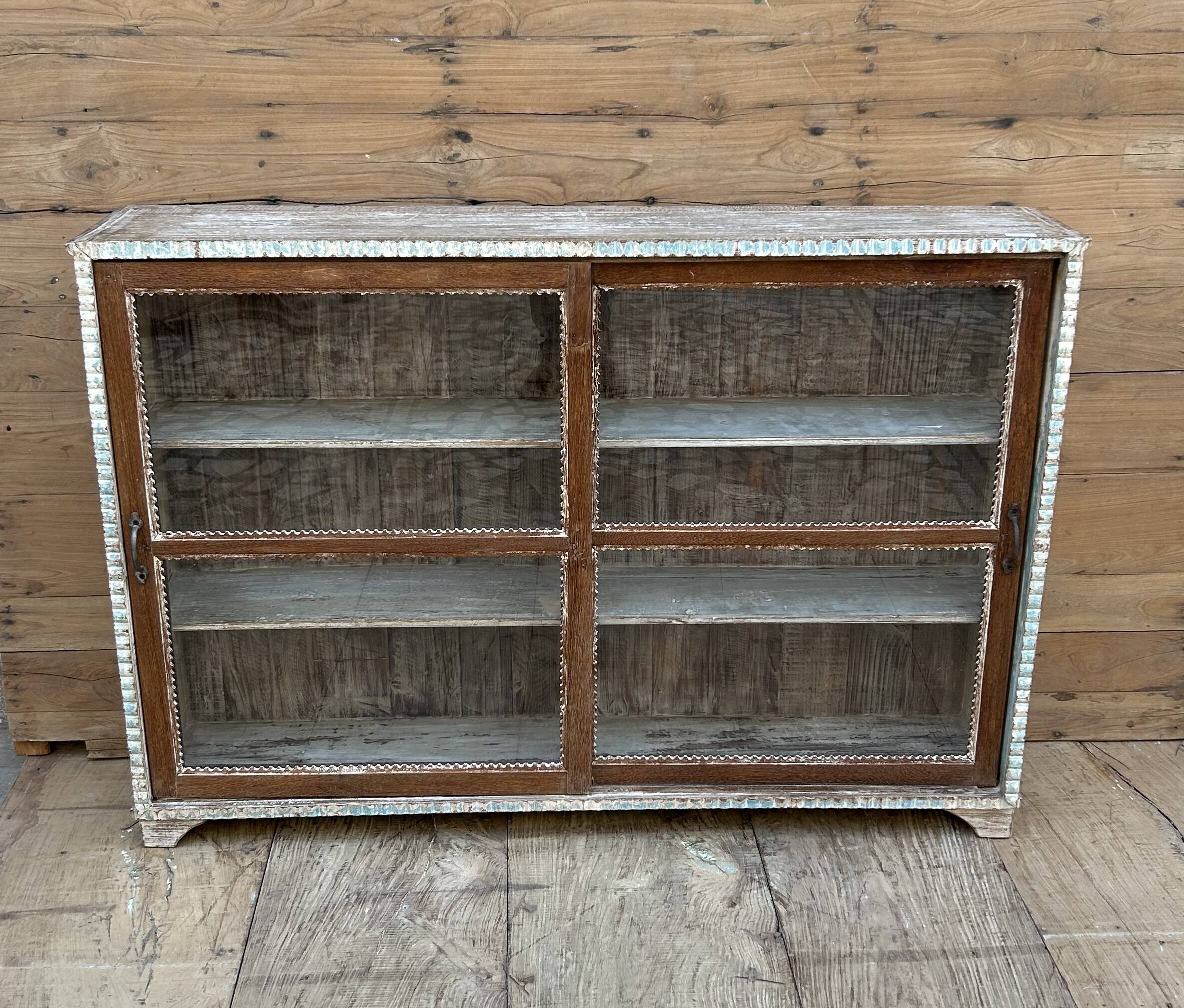 Teak display cabinet with sliding doors