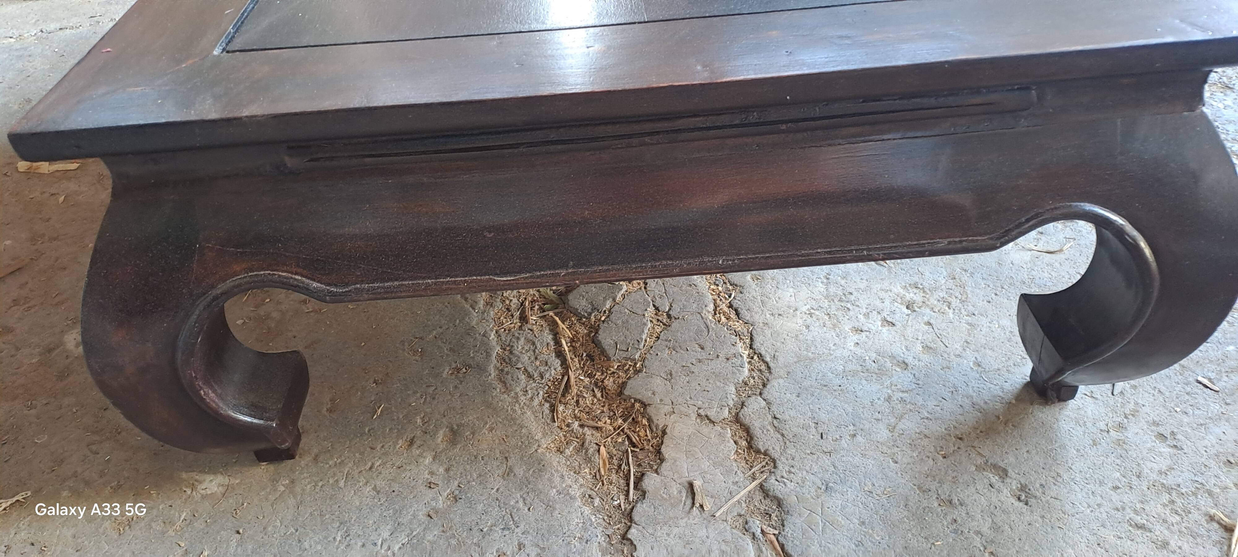 Rectangular coffee table made of exotic solid wood from the 1980s.