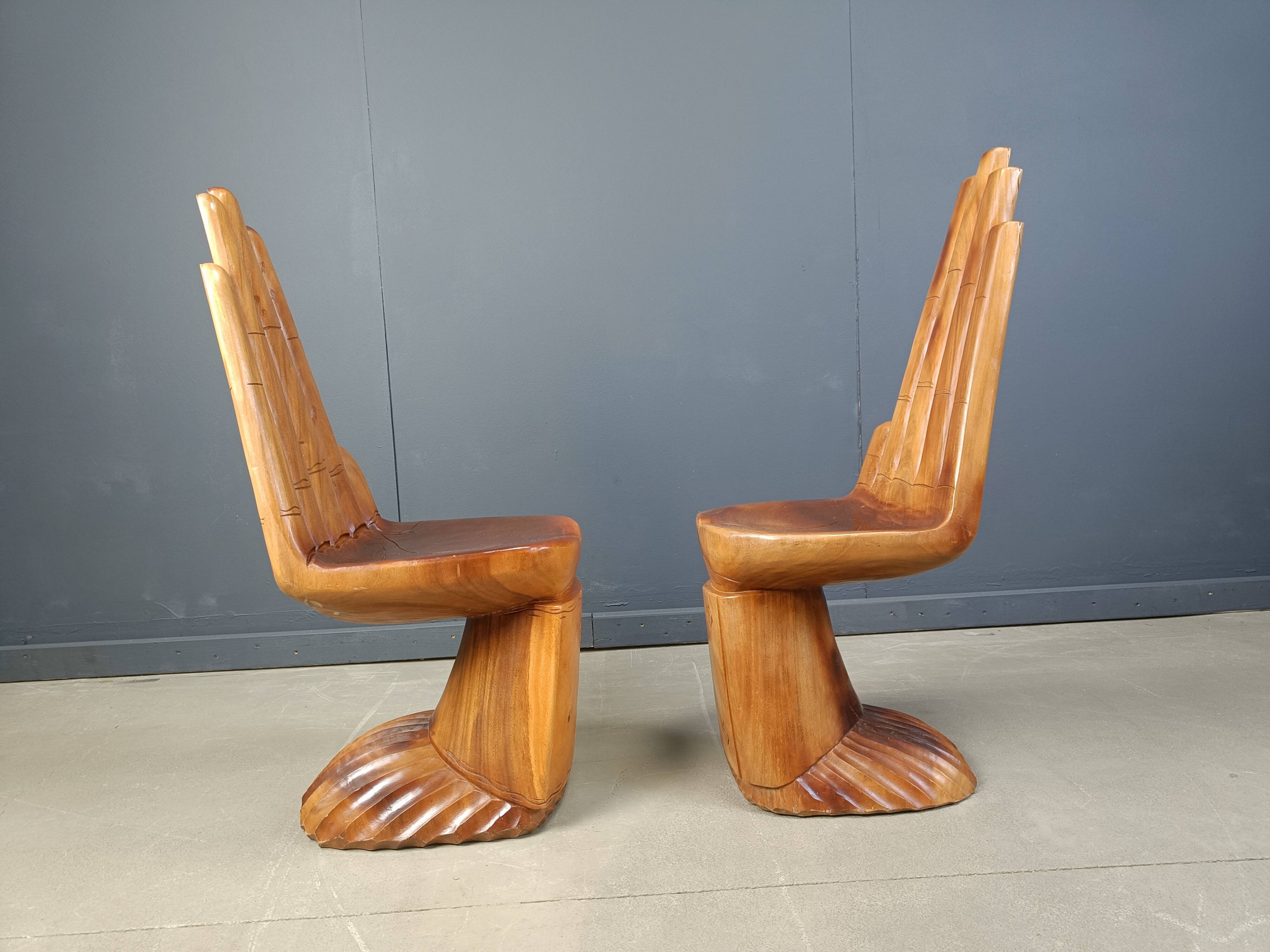 Pair of hand shaped teak chairs, 1970s