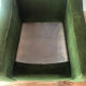 Fauteuil club vintage en velours cotelé.